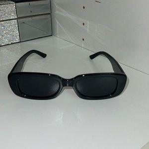 Woman’s  black sunglasses